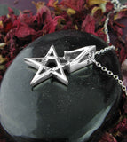 Tiny Wiccan Third Degree Pentagram Necklace High Priest Priestess Pentacle Witchcraft Witch Jewelry backside on shiny black rock with rose petals