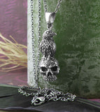 Raven Perched On Human Skull Oxidized Pendant | Woot & Hammy