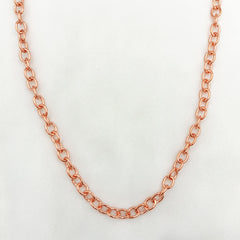 A heavy copper cable necklace with a polished finish, displayed in a U-shape against a plain white background.