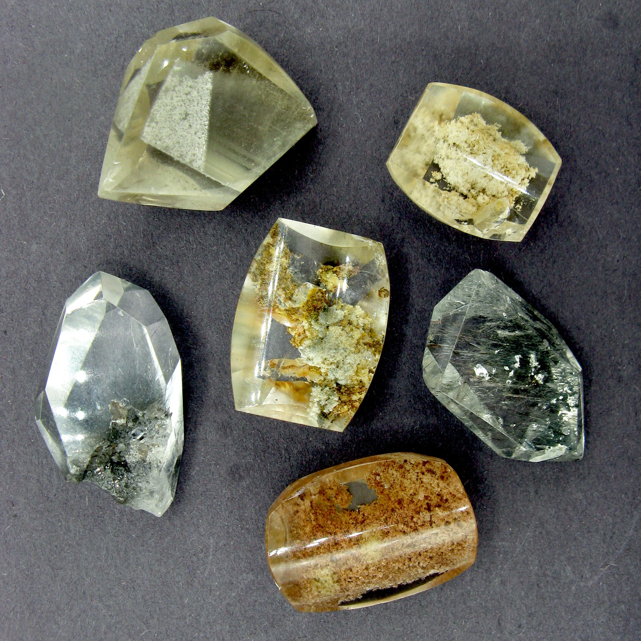 6 different Garden quartz druzy gemstones on  dark background