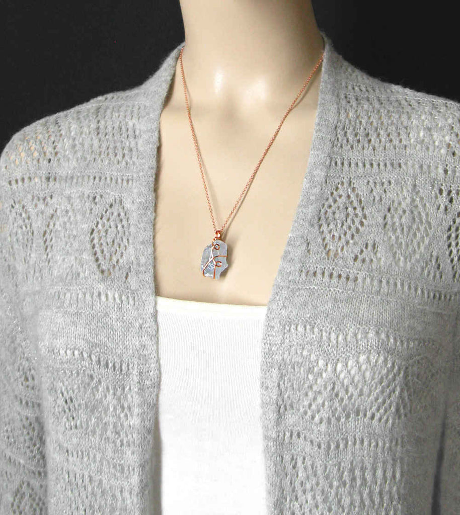 sky blue celestite pendant necklace copper wire wrapped protection healing stone celestine rock gem natural aqua rough gemstone on model