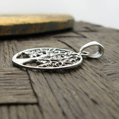 Round Cut-Out Tree of Life Pendant with Three-Dimensional Relief Sterling Silver Family Friends Hope New Beginnings Rebirth Renewal Interconnectedness Life Cycles Nature Seasons | Woot & Hammy