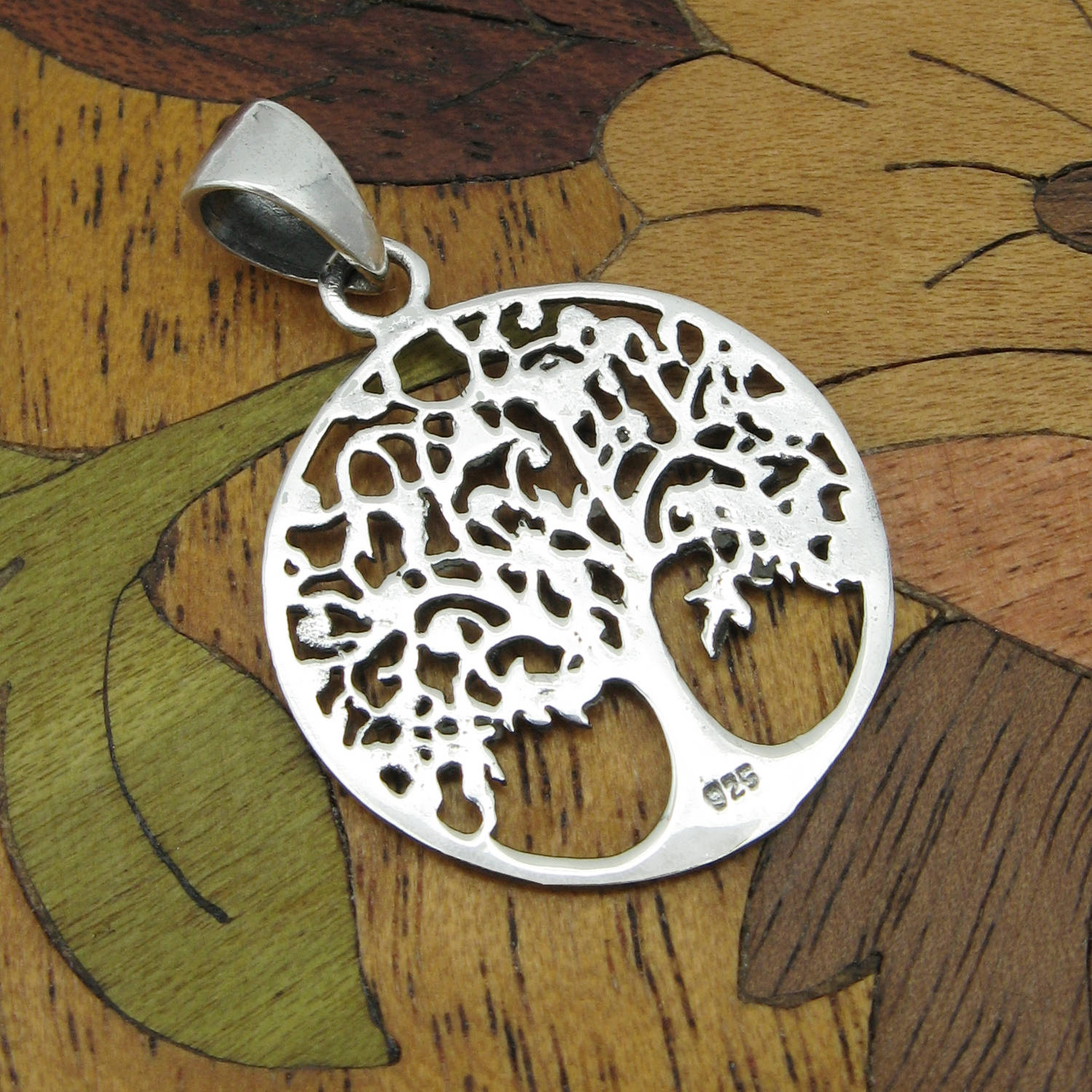 Round Cut-Out Tree of Life Pendant with Three-Dimensional Relief Sterling Silver Family Friends Hope New Beginnings Rebirth Renewal Interconnectedness Life Cycles Nature Seasons | Woot & Hammy
