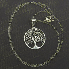 Round Cut-Out Tree of Life Pendant with Three-Dimensional Relief Sterling Silver Family Friends Hope New Beginnings Rebirth Renewal Interconnectedness Life Cycles Nature Seasons | Woot & Hammy