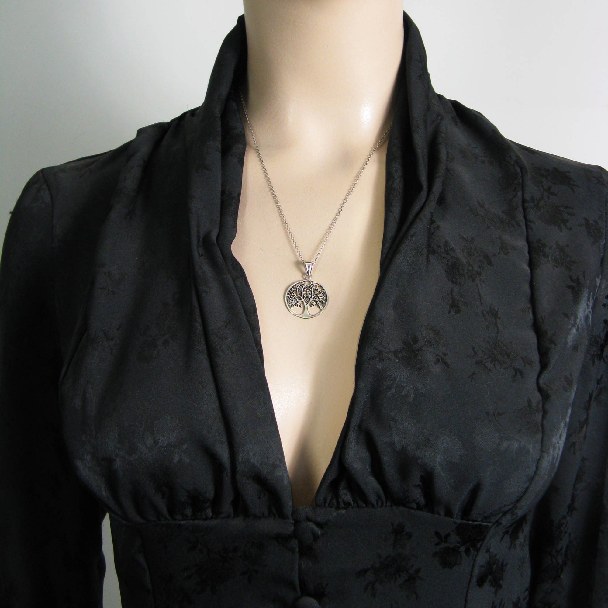 Round Cut-Out Tree of Life Pendant with Three-Dimensional Relief Sterling Silver Family Friends Hope New Beginnings Rebirth Renewal Interconnectedness Life Cycles Nature Seasons | Woot & Hammy