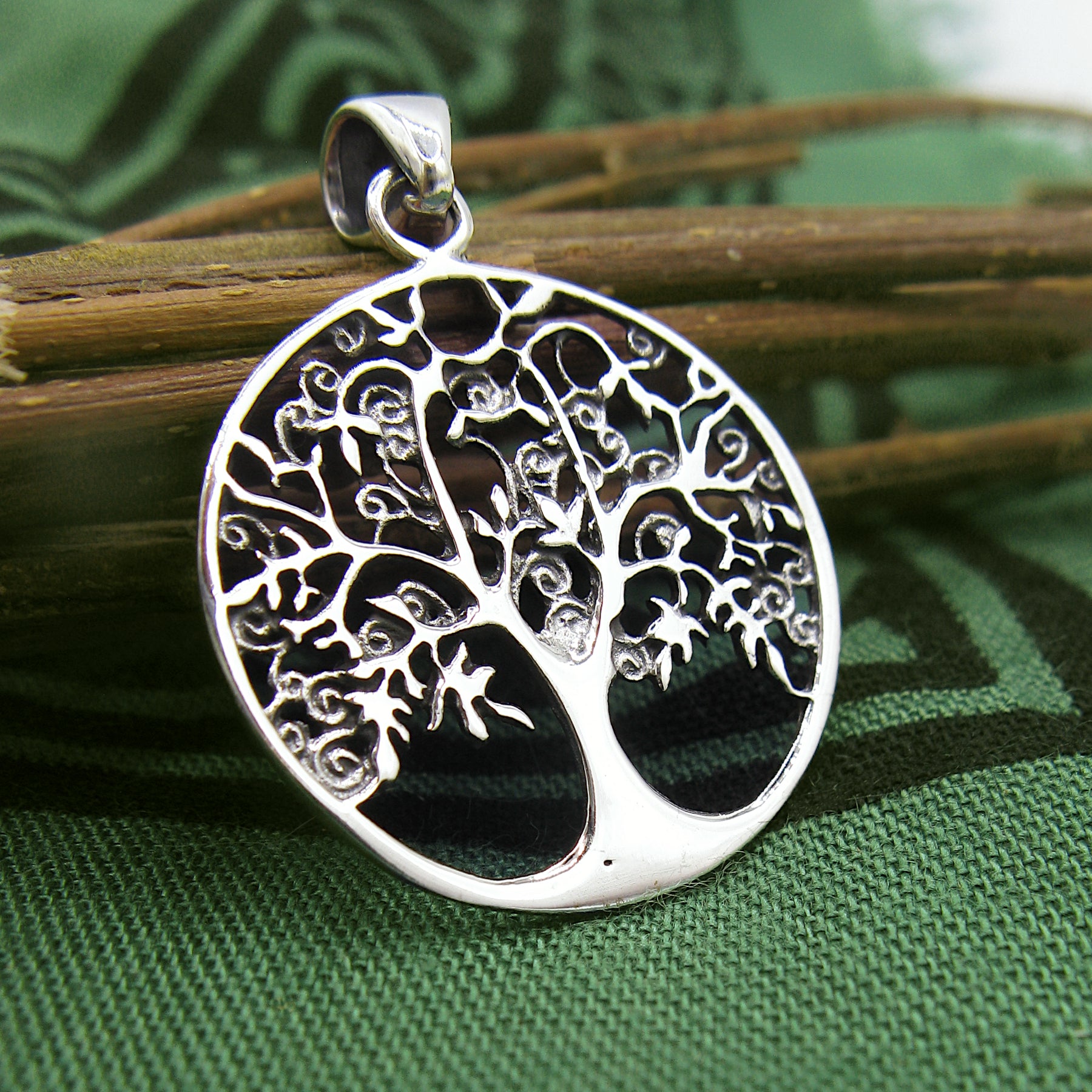Round Cut-Out Tree of Life Pendant with Three-Dimensional Relief Sterling Silver Family Friends Hope New Beginnings Rebirth Renewal Interconnectedness Life Cycles Nature Seasons | Woot & Hammy