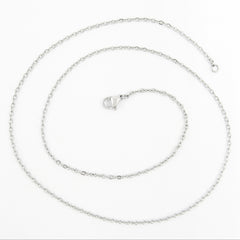 A silver stainless steel chain necklace with lobster clasp arranged in a spiral pattern on a white background.