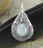 Polished Teardrop-Shaped Rainbow Moonstone Cabochon With Inscribed Silver Setting Pendant - Handmade | Woot & Hammy