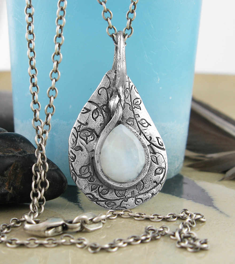 Polished Teardrop-Shaped Rainbow Moonstone Cabochon With Inscribed Silver Setting Pendant - Handmade | Woot & Hammy