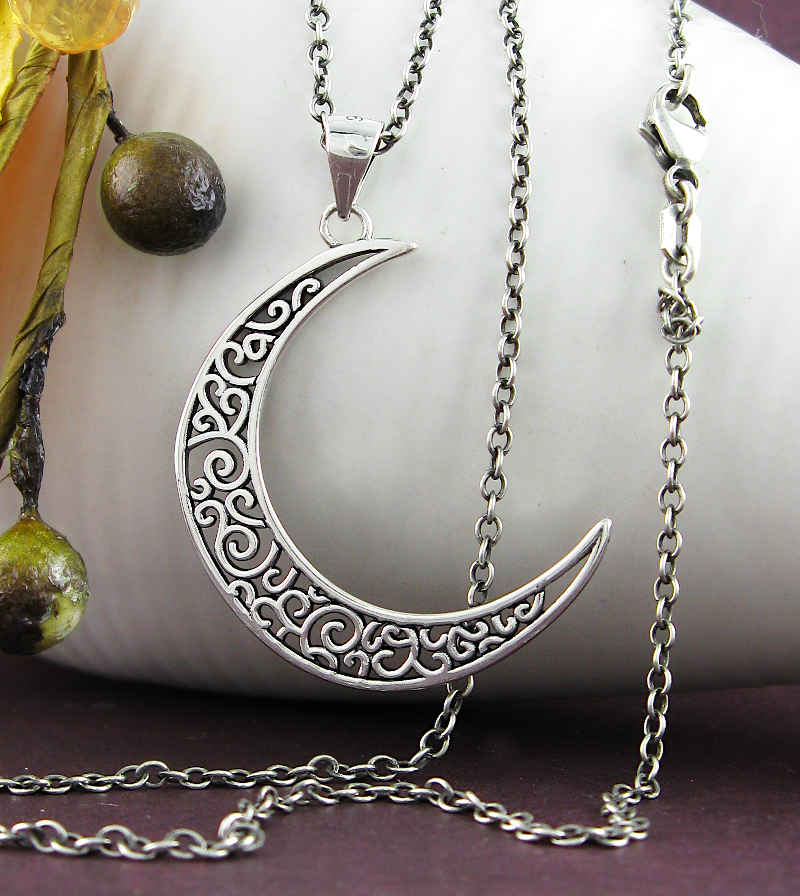 Crescent Moon With Decorative Spirals and Swirls Pendant