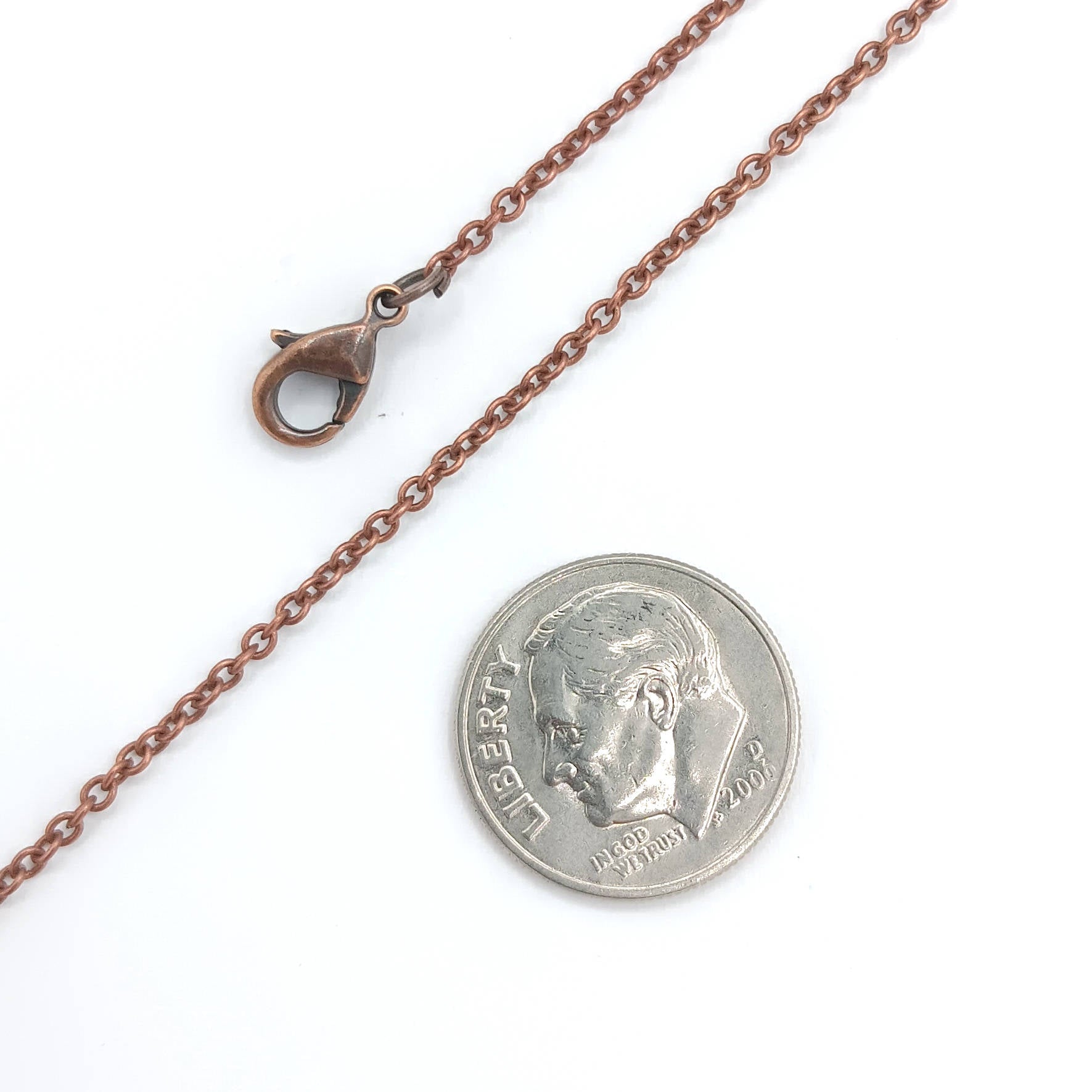 oxidized dainty copper necklace, compared to size of dime