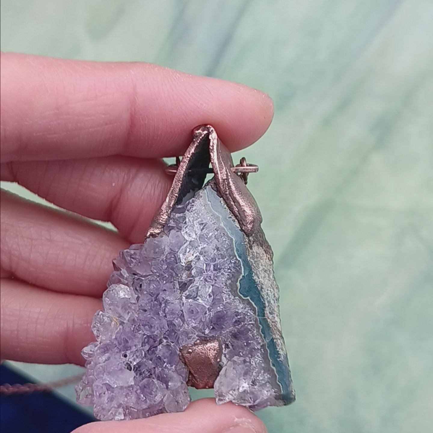 Raw triangle amethyst stalactite copper electroformed pendant video showing all angles
