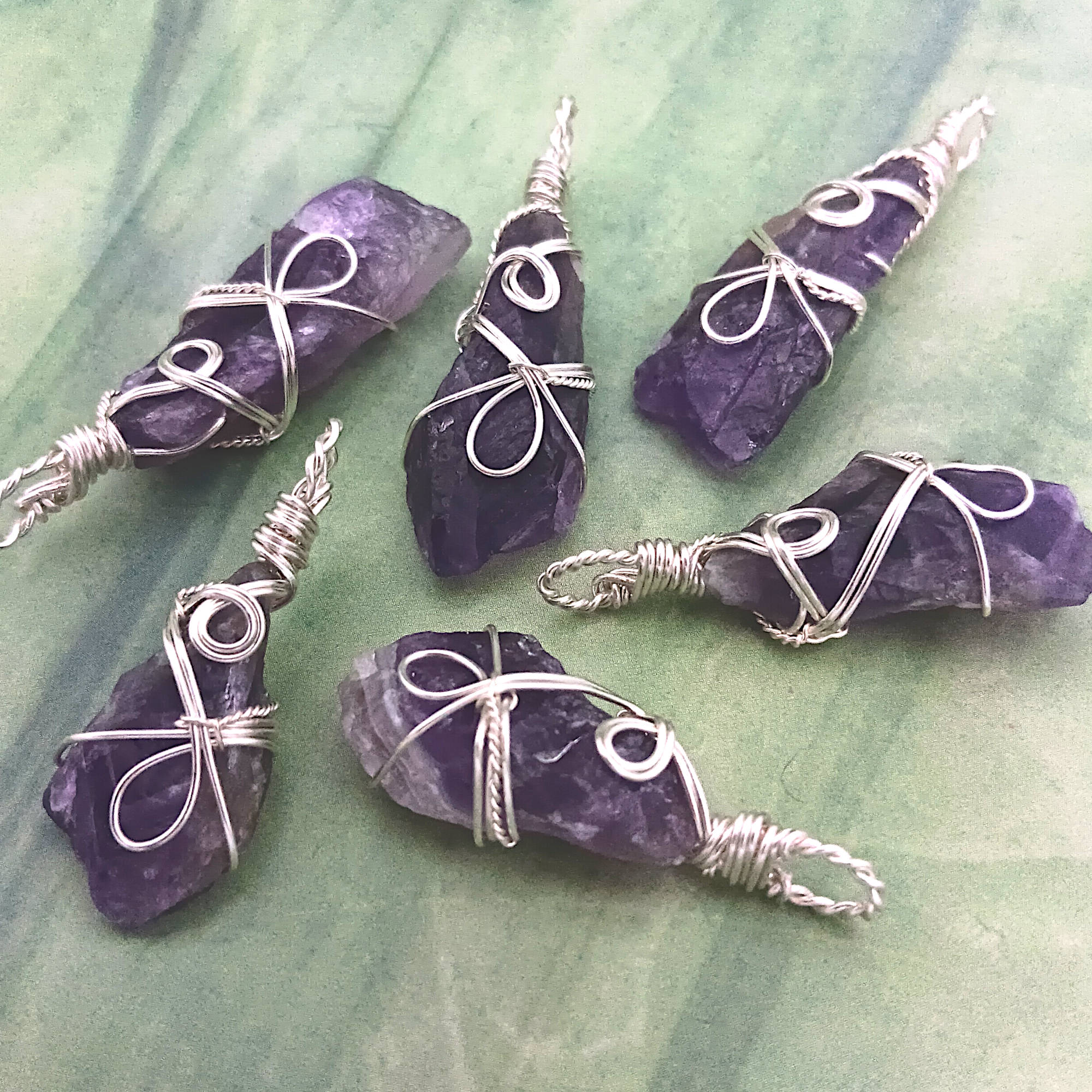 Raw Amethyst Crystal Point Pendant silver wire wrapped, showing different angles