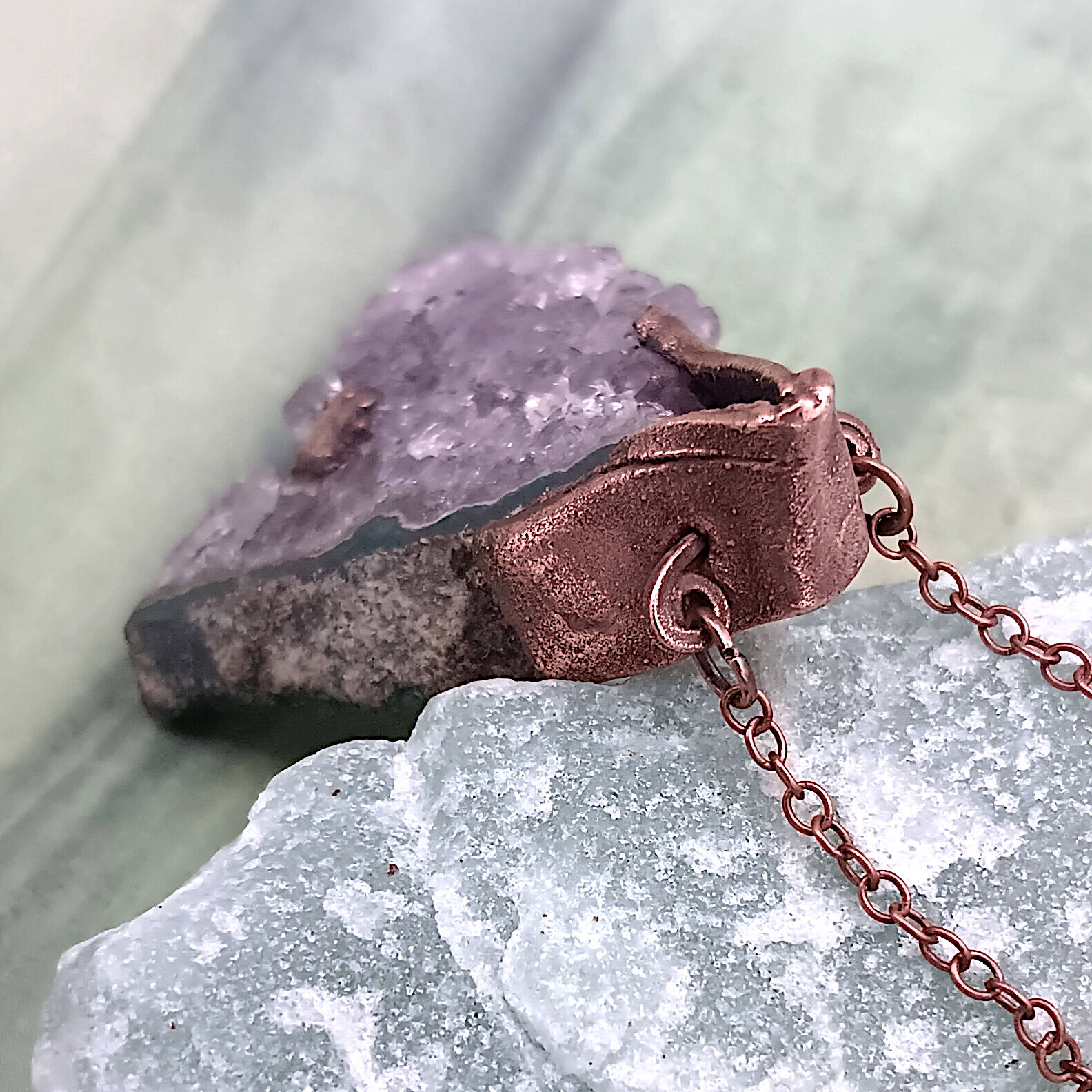Raw triangle amethyst stalactite copper electroformed pendant showing top of pendant and closeup of wire bail