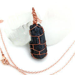 Raw black tourmaline pendant wire wrapped in copper on 20-inch chain