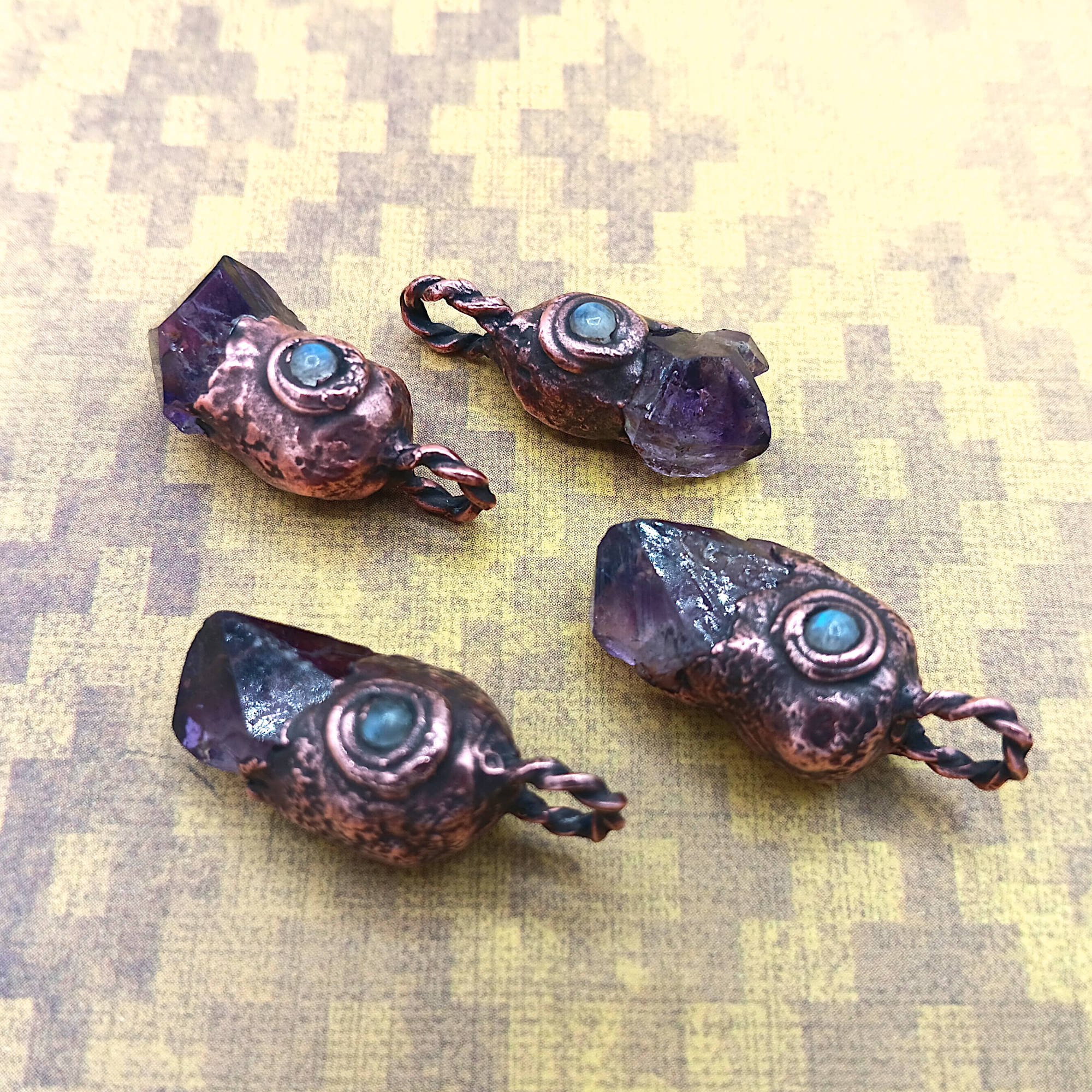 tiny raw amethyst crystal moonstone copper pendant scattered, showing fronts