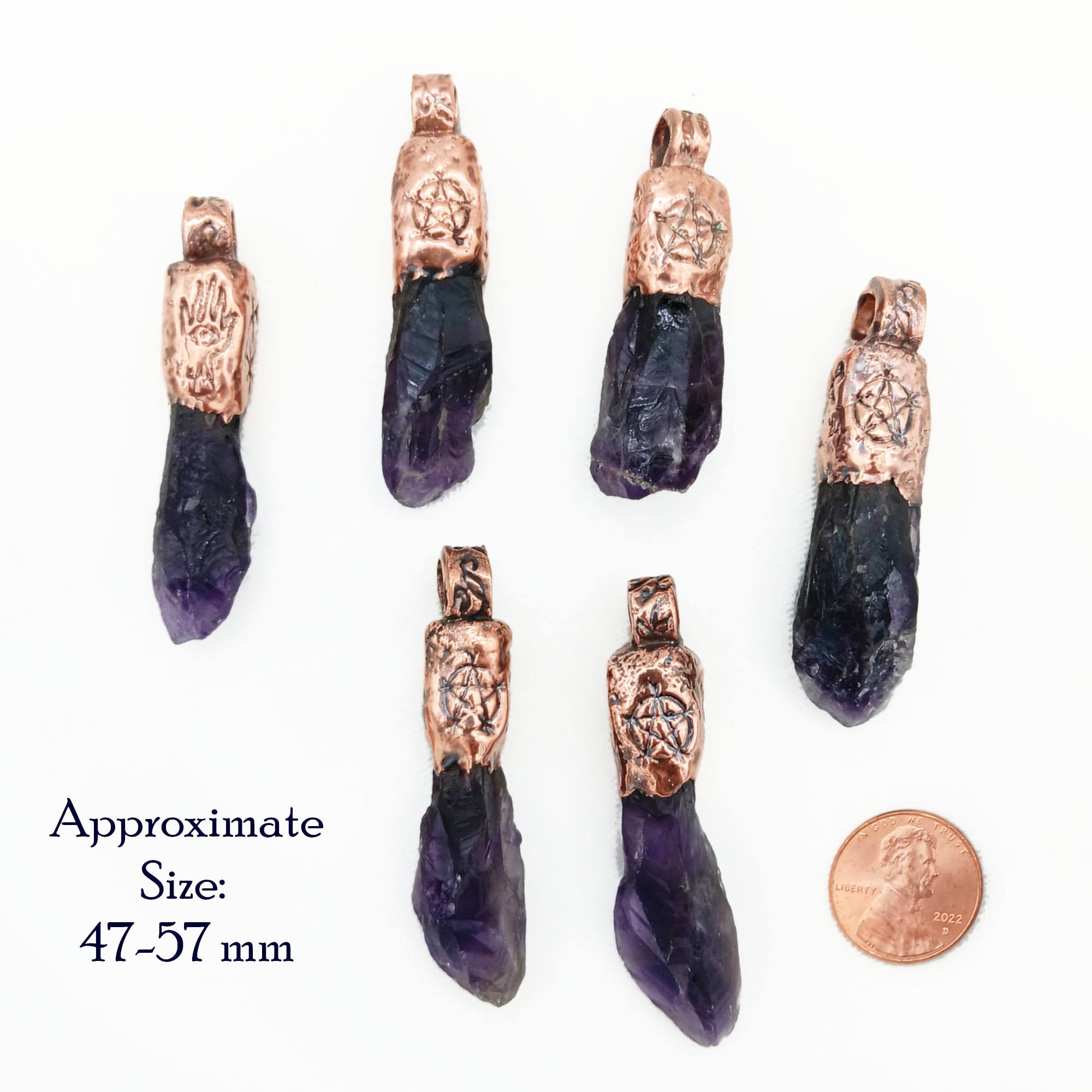 Handmade amethyst amulet pendant with grape-purple crystal, copper vine bail, and choice of Hamsa hand or Eye of Horus for spiritual protection.