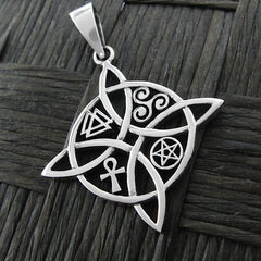 Front view of a silver witch's knot pendant with four symbols on a dark basket weave background