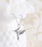 Tiny Hummingbird Pendant in Sterling Silver