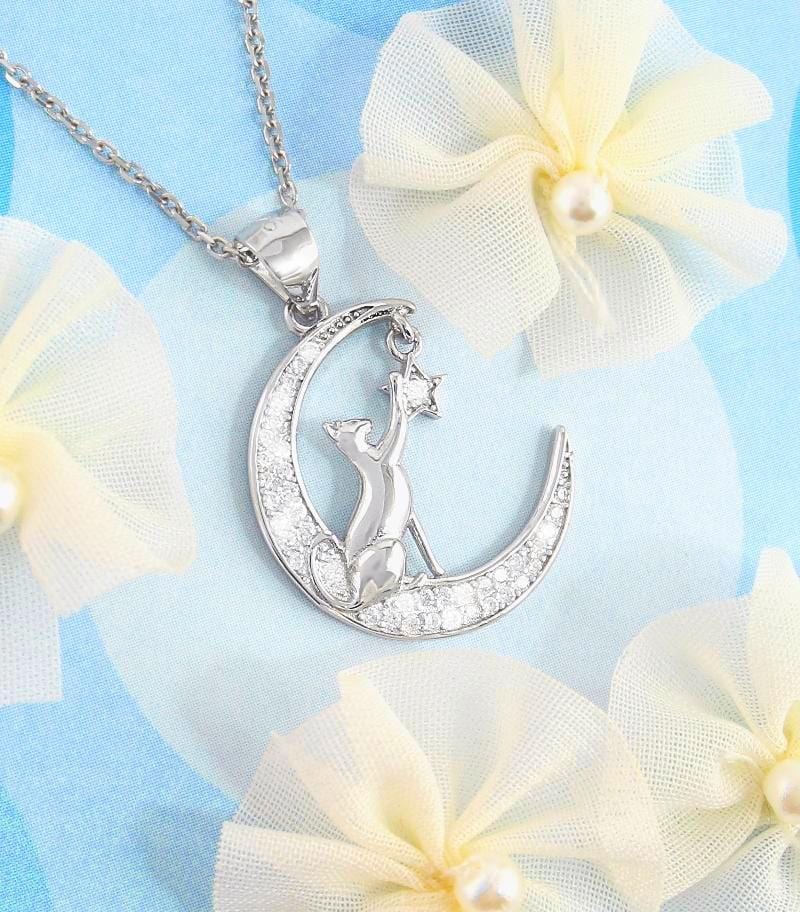 Cat Reaching for a Star on a Crescent Moon Necklace - woot & hammy