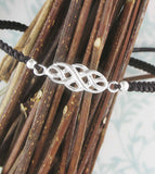 Bracelet d'amitié réglable avec symbole de l'infini et nœud celtique