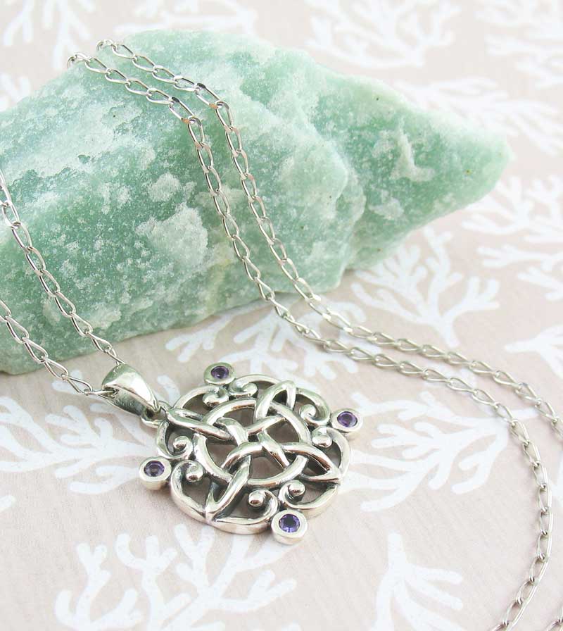 Ornate Witch's Knot Pendant with Amethyst Crystals