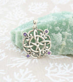 Ornate Witch's Knot Pendant with Amethyst Crystals