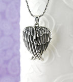 Pendentif médaillon ailes d'ange pliées en forme de cœur