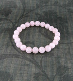 Bracelet extensible perlé de pierres précieuses de quartz rose