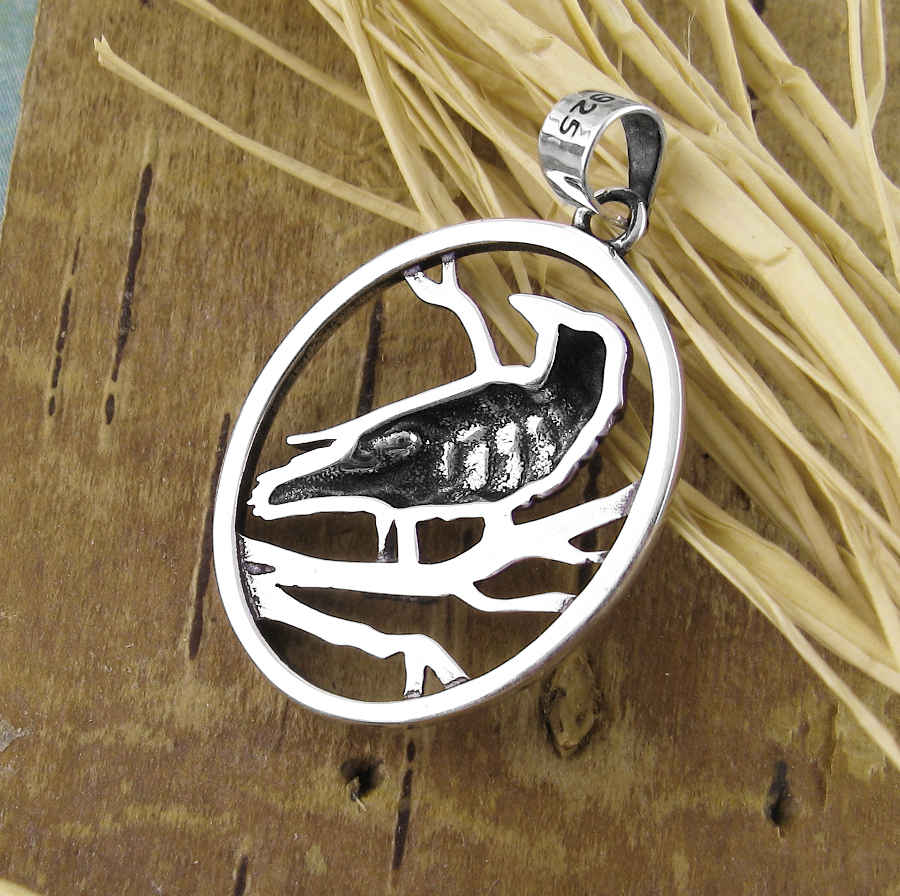 Raven Perched In Tree Oval Pendant | Woot & Hammy