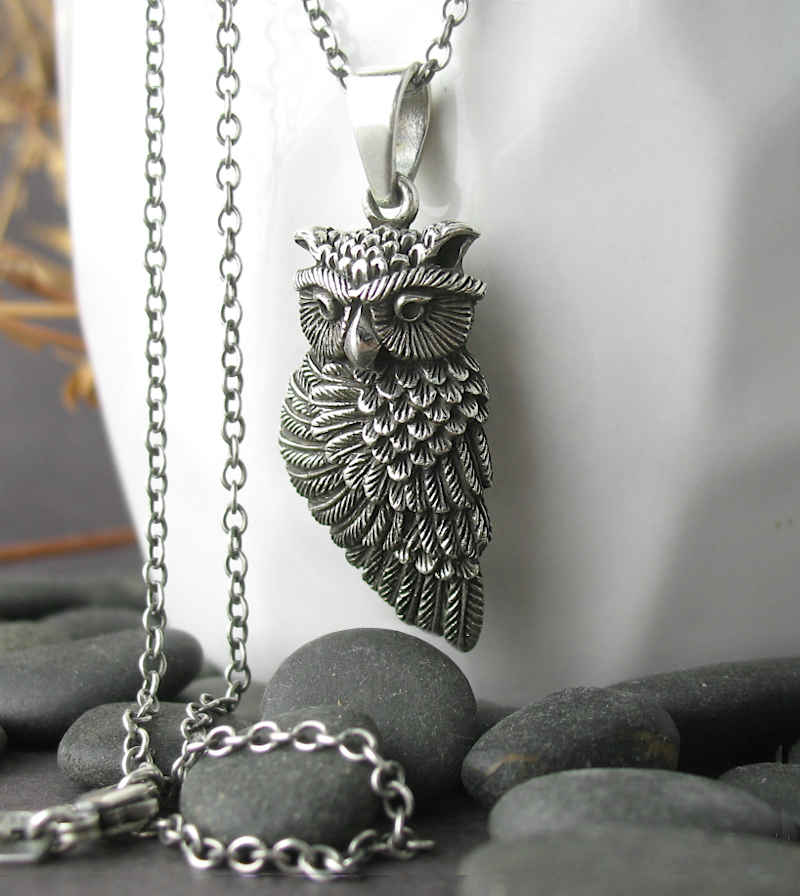 Owl With a Wing Wrapped Around Itself Pendant Side View Profile Head Turned