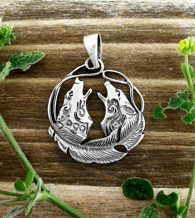 Two Howling Wolves With Feather Border Tribal Pendant | woot & hammy