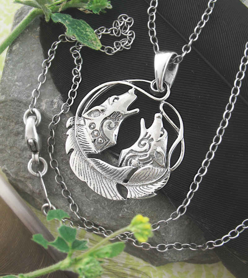 Two Howling Wolves With Feather Border Tribal Pendant | woot & hammy